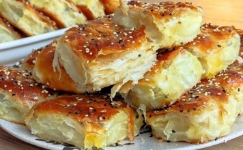 Börek: Geleneksel Lezzetin Modern Yorumları Börek, Türk mutfağının en sevilen hamur işleri arasında yer alır. İnce açılmış yufkaların, çeşitli iç malzemelerle buluşması sonucu ortaya çıkan börek, kahvaltıdan ana öğüne kadar pek çok öğünde tercih edilebilir. Geleneksel tarifler, nesilden nesile aktarılırken, modern mutfaklarda farklı dolgu ve pişirme teknikleriyle yeni yorumlar kazanıyor. Konulu bir haber görseli.