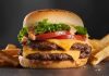 Fast food kültürü her geçen gün daha da genişlerken Double Burger hem restoran menülerinin hem de tüketicilerin gözdesi haline geliyor. Tek katlı burgerlerin sunduğu lezzeti iki katına çıkaran bu özel tarif, daha doyurucu bir alternatif arayanların ilk tercihlerinden biri. İki kat et, eriyen peynir, soslar ve taze sebzelerle hazırlanan bu burger çeşidi, yoğun lezzet deneyimi arayanlara hitap ediyor. Konulu bir haber görseli.