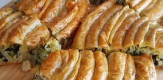 Ispanaklı börek, hem kahvaltı sofralarının hem de özel davetlerin vazgeçilmez lezzetlerinden biridir. İncecik açılmış yufkaların arasında yer alan ıspanak, böreğe hem doğal bir renk hem de zengin bir besin değeri katar. Ispanaklı börek, özellikle ev yapımı olduğunda, hem lezzet hem de sağlık açısından sofralara değer katar. Bu yazımızda ıspanaklı böreğin tarihçesinden malzeme seçimlerine, hazırlık aşamalarından pişirme tekniklerine kadar detaylı bilgiler bulabilirsiniz. Konulu bir haber görseli.
