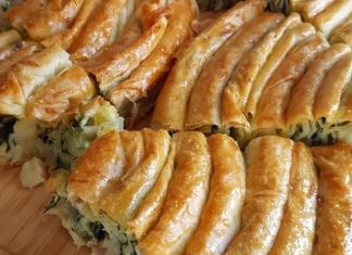 Ispanaklı Börek: Geleneksel Lezzetin Modern Sunumu Ispanaklı börek, hem kahvaltı sofralarının hem de özel davetlerin vazgeçilmez lezzetlerinden biridir. İncecik açılmış yufkaların arasında yer alan ıspanak, böreğe hem doğal bir renk hem de zengin bir besin değeri katar. Ispanaklı börek, özellikle ev yapımı olduğunda, hem lezzet hem de sağlık açısından sofralara değer katar. Bu yazımızda ıspanaklı böreğin tarihçesinden malzeme seçimlerine, hazırlık aşamalarından pişirme tekniklerine kadar detaylı bilgiler bulabilirsiniz. Konulu bir haber görseli.