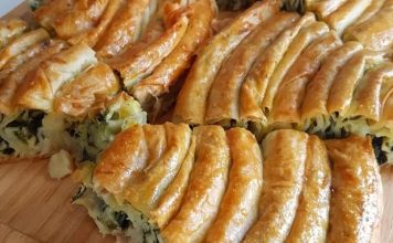 Ispanaklı börek, hem kahvaltı sofralarının hem de özel davetlerin vazgeçilmez lezzetlerinden biridir. İncecik açılmış yufkaların arasında yer alan ıspanak, böreğe hem doğal bir renk hem de zengin bir besin değeri katar. Ispanaklı börek, özellikle ev yapımı olduğunda, hem lezzet hem de sağlık açısından sofralara değer katar. Bu yazımızda ıspanaklı böreğin tarihçesinden malzeme seçimlerine, hazırlık aşamalarından pişirme tekniklerine kadar detaylı bilgiler bulabilirsiniz. Konulu bir haber görseli.
