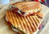 Karışık tost, özellikle Türkiye’de sabah kahvaltılarının ve ara öğünlerin vazgeçilmez lezzetlerinden biri haline gelmiştir. Bu tost çeşidi, klasik kaşarlı tostun ötesine geçerek sucuk, salam, domates, biber ve peynir gibi malzemelerin bir araya gelmesiyle hazırlanır. Böylece hem doyurucu hem de zengin bir lezzet sunar. Konulu bir haber görseli.