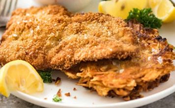 Schnitzel, Almanya ve Avusturya mutfaklarının en bilinen yemeklerinden biridir. İnce dilimlenmiş etin pane harcıyla kaplanıp kızartılmasıyla elde edilen bu lezzet, hem sokak yemekleri hem de restoran menülerinde sıklıkla yer alır. İsmi Almanca “dilim” anlamına gelen “Schnitt” kelimesinden türemiştir ve geleneksel olarak dana veya tavuk eti kullanılır. Konulu bir haber görseli.